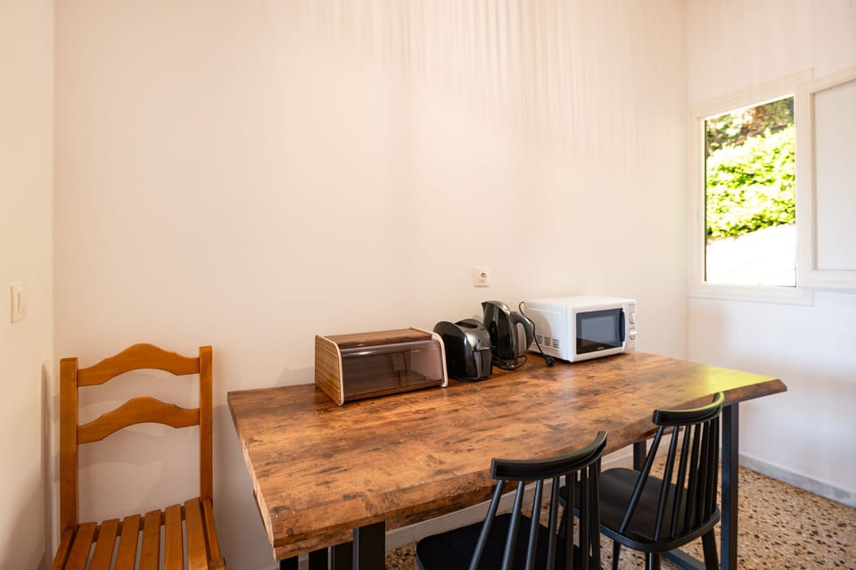 Dining table and kitchen amenities
