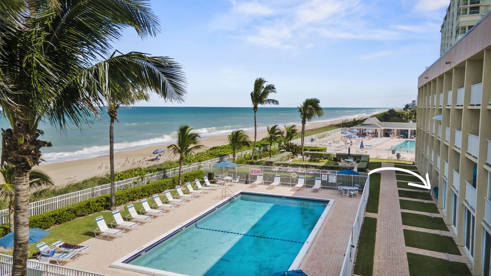 Hear the crashing waves 24/7, just steps to  pool, grills and beach entry.