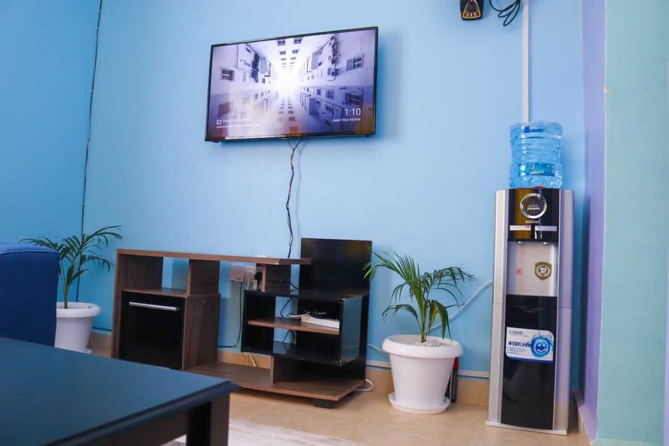 Comfort Apartment | Living area | 43-inch Smart TV with digital channels, Netflix, streaming services