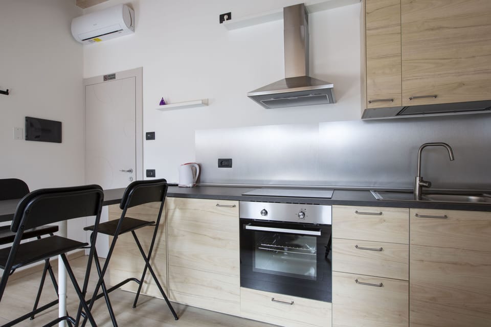 Family Triple Room, 1 Bedroom | Private kitchen