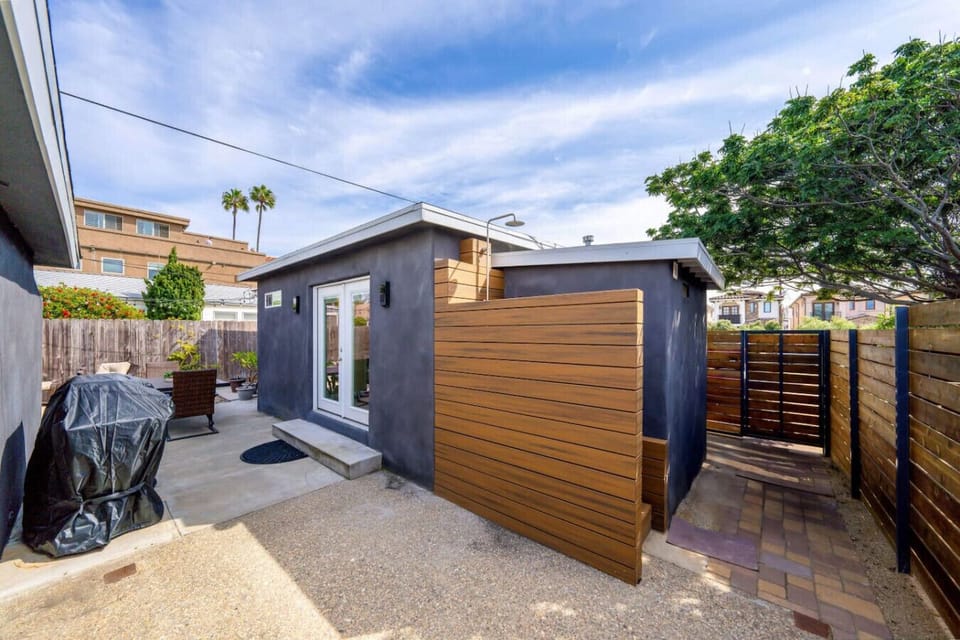 Private fenced outdoor space with easy access to the home and backyard amenities.