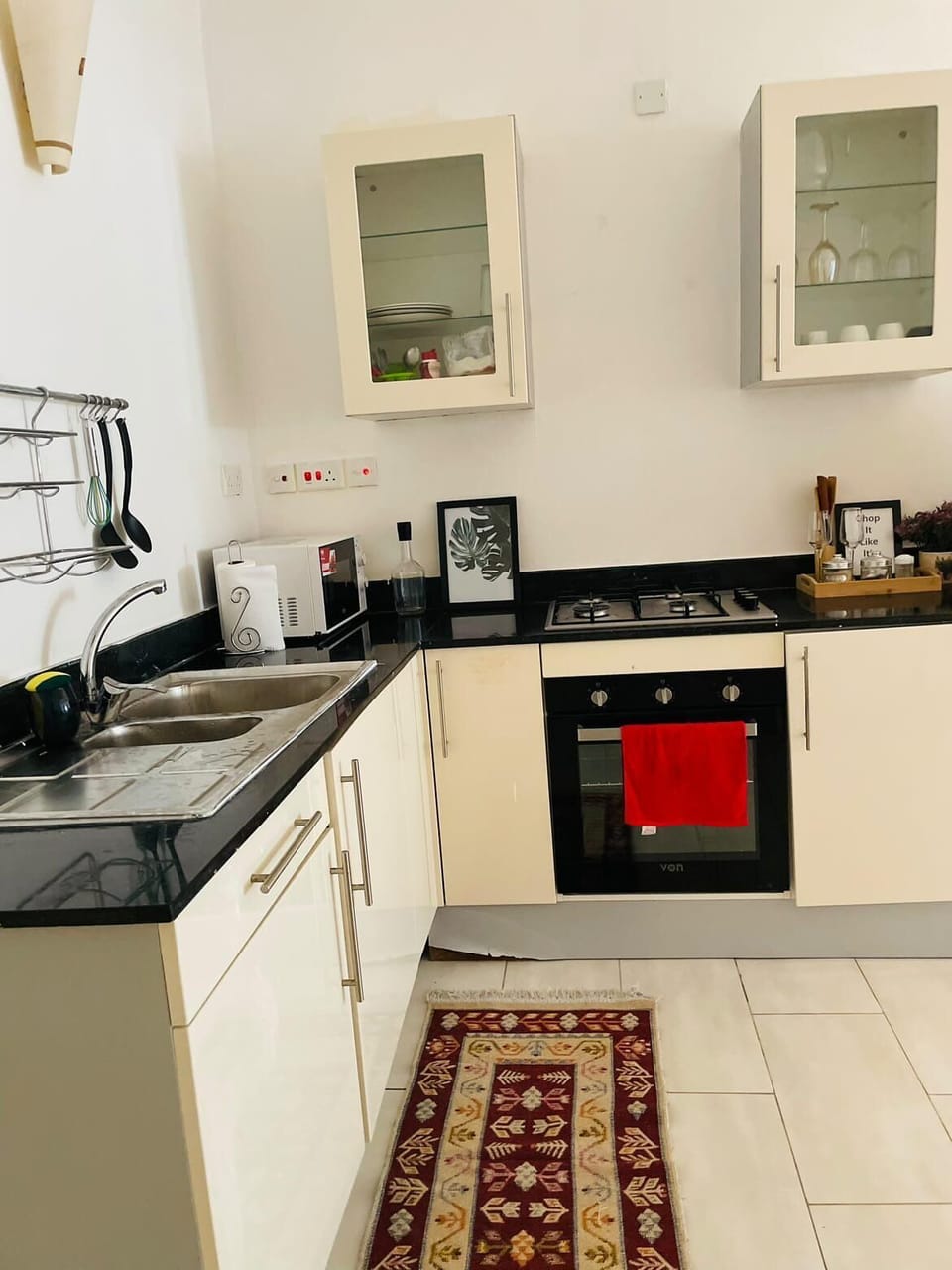 Superior Apartment | Private kitchen | Microwave, oven, cookware/dishes/utensils, cleaning supplies