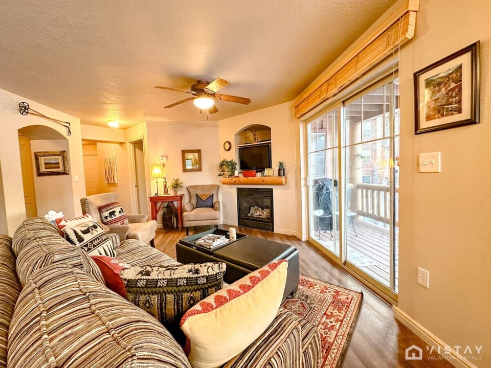 Enjoy your favorite shows or movies on the TV while lounging on the plush sofa.