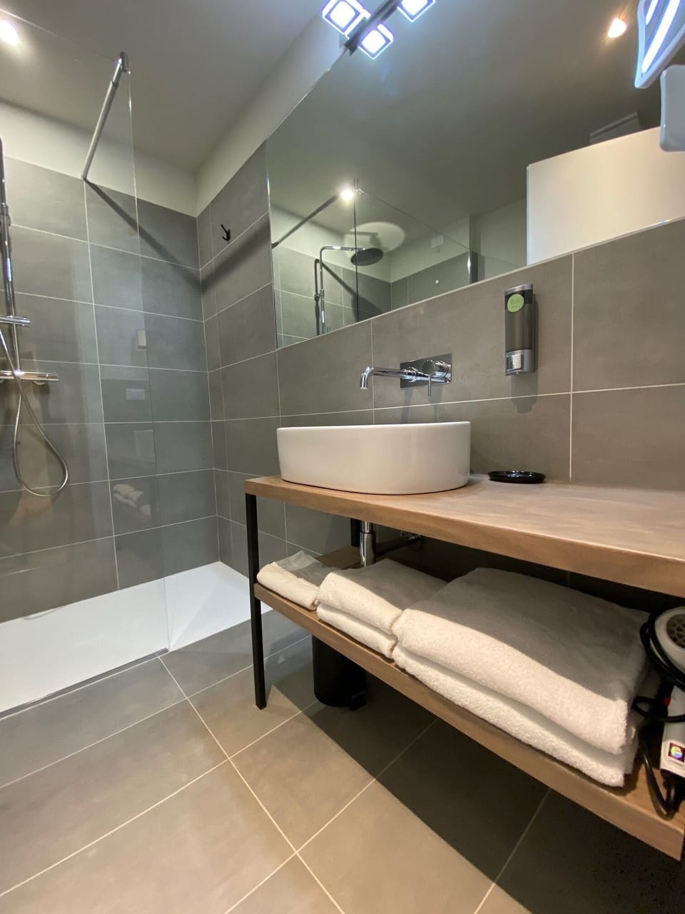 Superior Townhome | Bathroom | Shower, rainfall showerhead, hair dryer, bathrobes