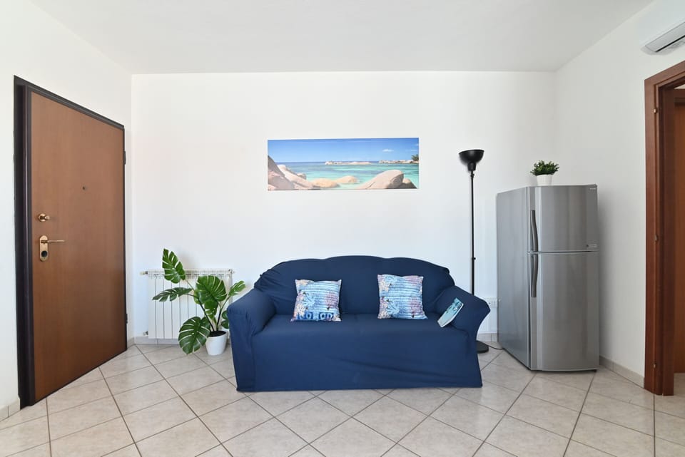 Standard Apartment | Living room | 49-inch Smart TV with cable channels