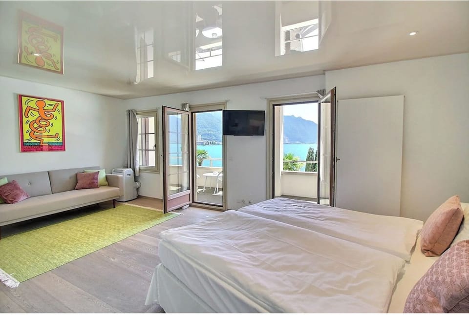 Junior Suite Signature, Balcony & Lake View | Premium bedding, minibar, in-room safe, blackout drapes