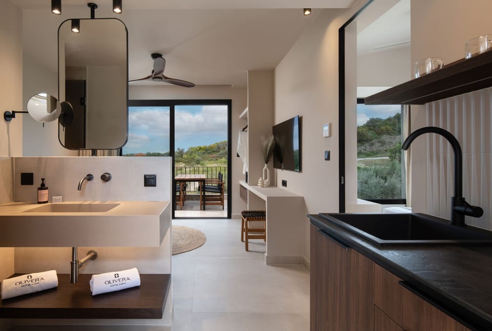 Suite, Hot Tub | Living area | 42-inch Smart TV with digital channels