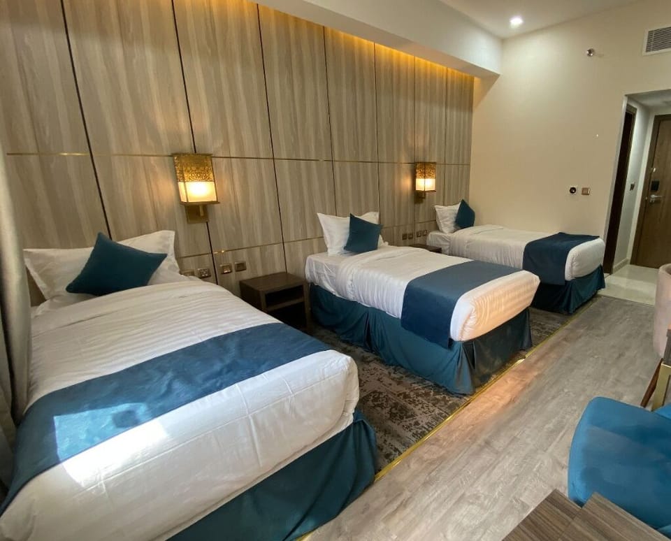 Triple Room | In-room safe, blackout drapes, soundproofing, iron/ironing board
