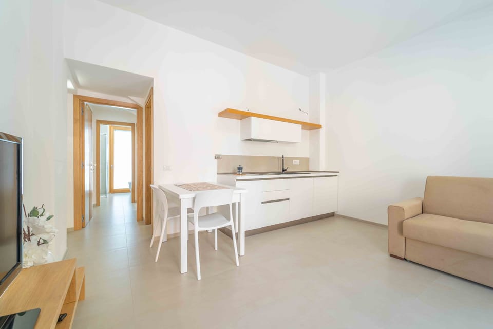 Comfort Apartment | Living area | LED TV, printers