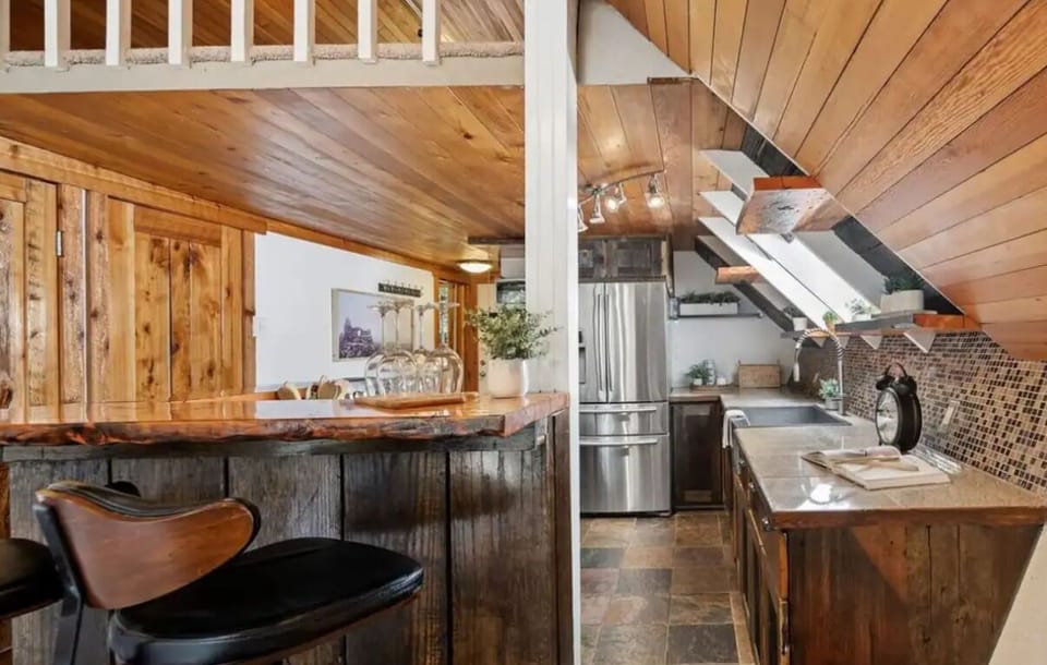 View of the kitchen from the cozy living room.
