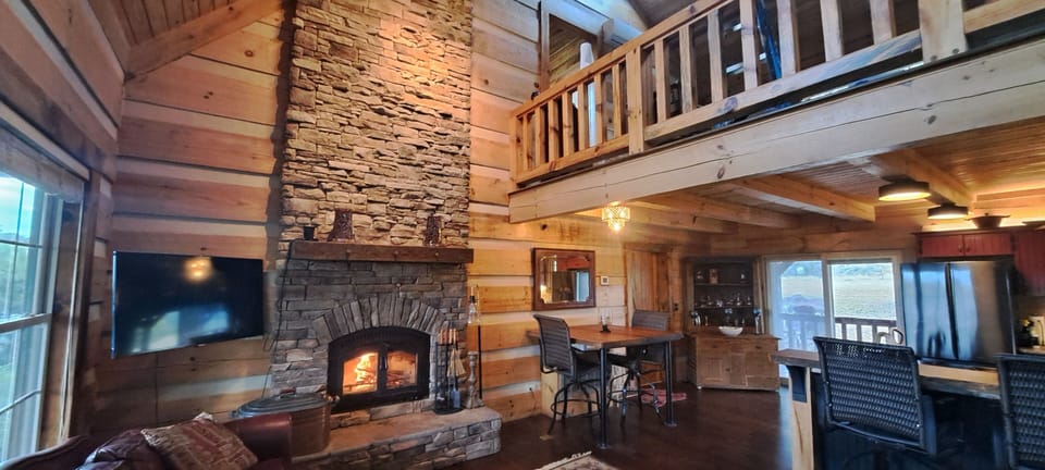 cozy woodburning fireplace   (firewood provided )
corner mount tv for viewing 