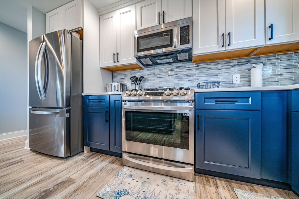 Stunning two-tone cabinetry with premium appliances
