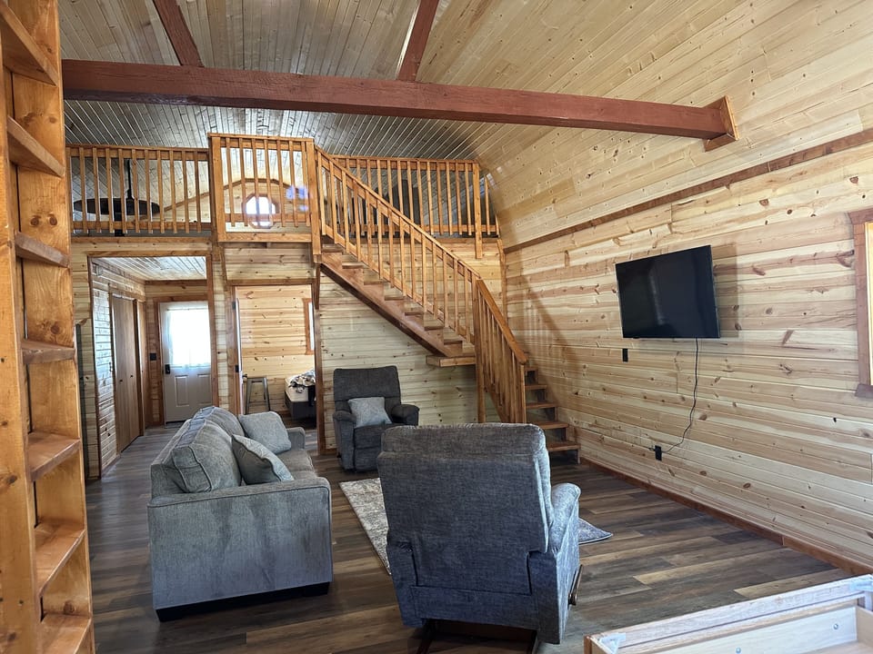 View of the living area and the upstairs loft