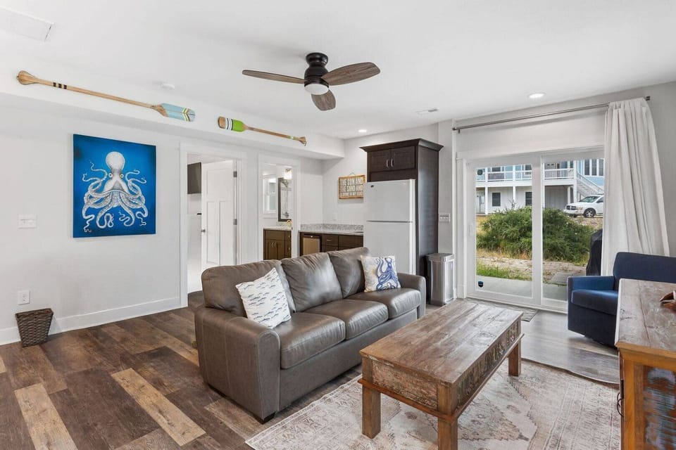 Head to the Entertainment Room with a Couch and Wet Bar for some fun!