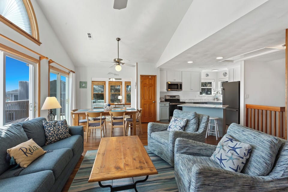 Enjoy your favorite shows on the large, Flat Screen TV and relax on the plentiful cozy furniture beneath high ceilings and tasteful coastal decor.