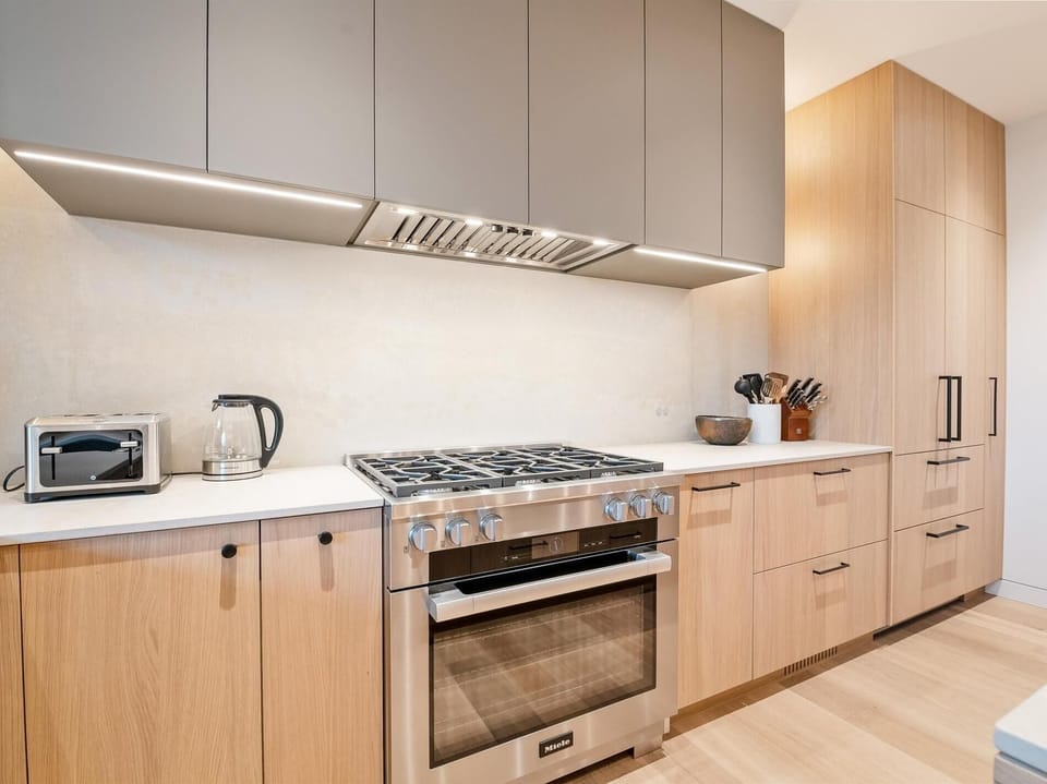 Gas range, built in fridge and all new appliances