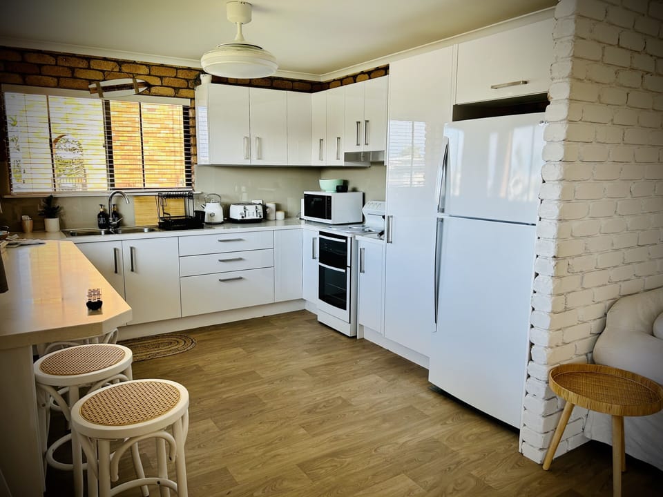 Standard Apartment, Canal View | Private kitchen | Full-size fridge, microwave, oven, stovetop