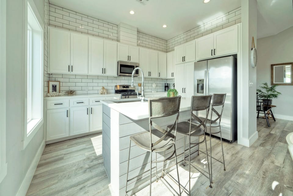 Additional barstool seating in the kitchen.