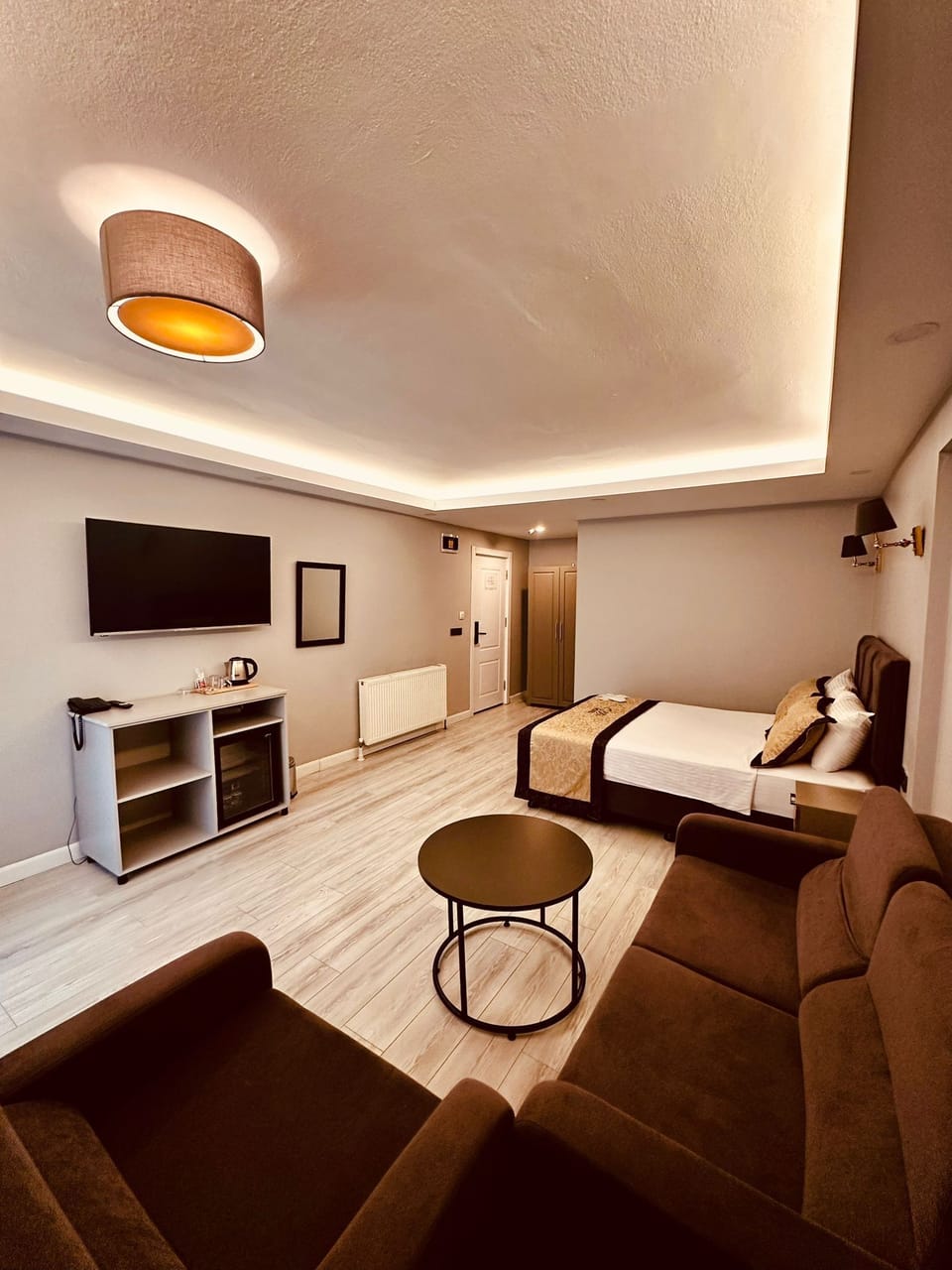 Deluxe Room with Balcony | In-room safe, laptop workspace, blackout drapes, soundproofing