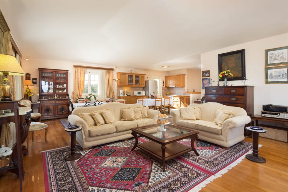 Family Villa | Living area | 45-inch LCD TV with cable channels