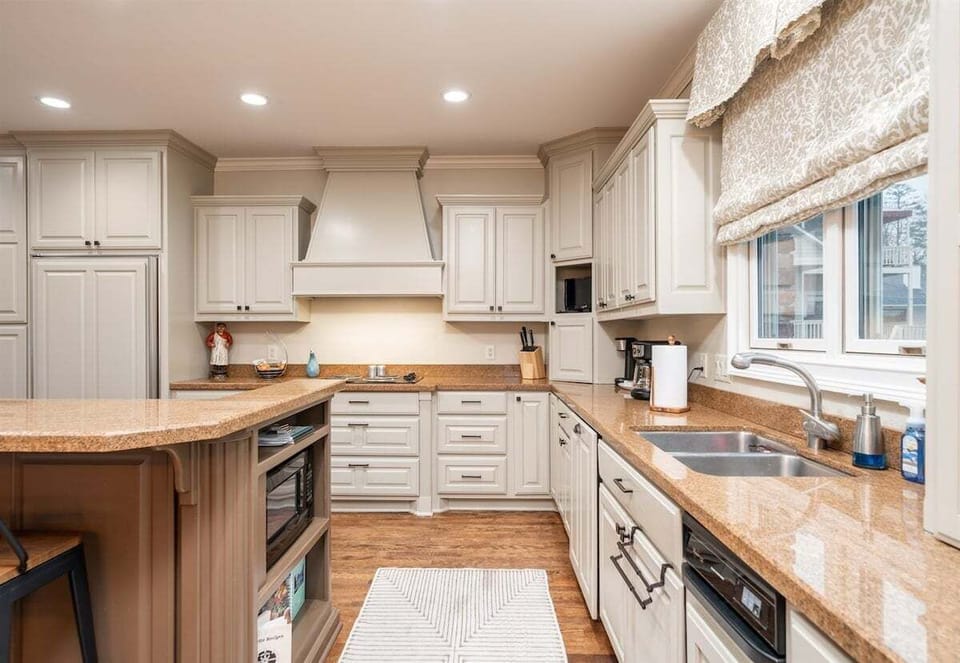 [Kitchen] The Bright and Spacious Kitchen is Filled with Everything you'd Need to Whip Up a Family Favorite.