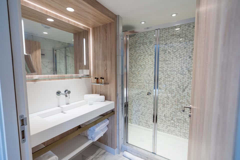Hair dryer, bathrobes, slippers, towels