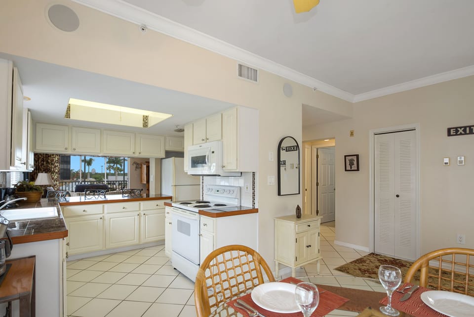 Dining Area toward Kitchen and Guest Bath