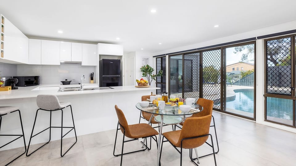 Coastal Breezes | Kitchen downstairs | Microwave | Coffee machine | Swimming pool
