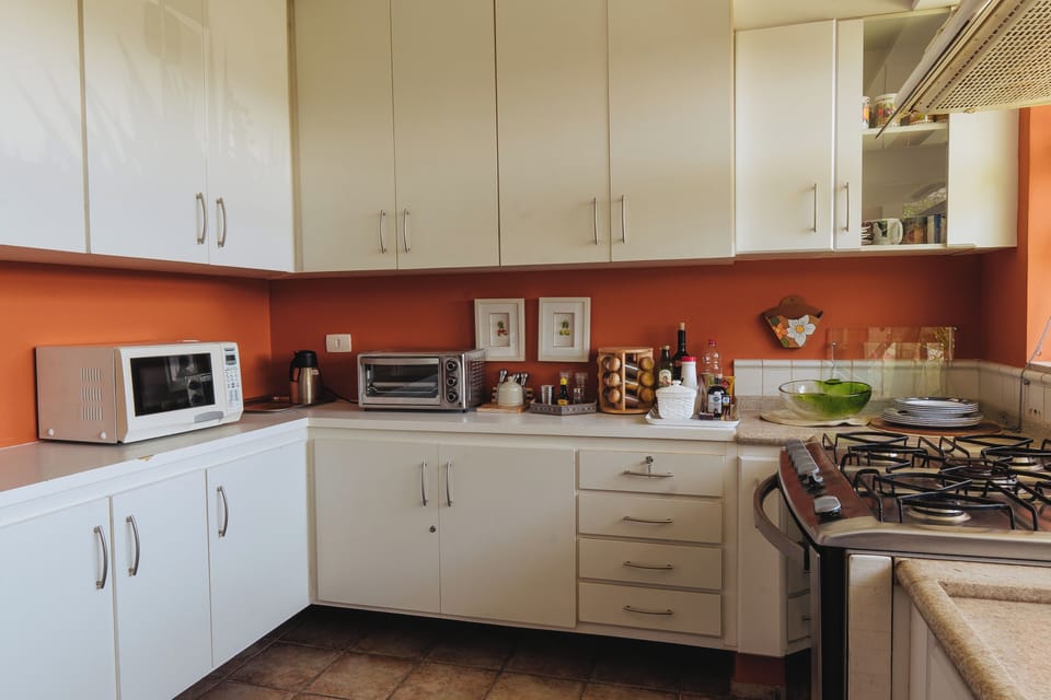 Villa | Private kitchen | Microwave, oven, toaster, blender
