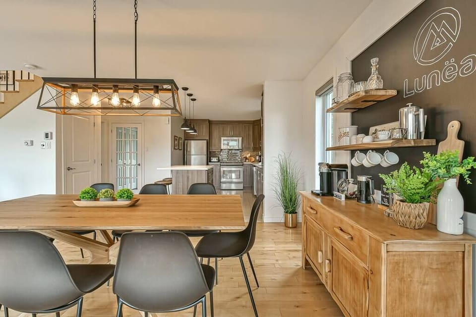 Dining table, coffee area and kitchen