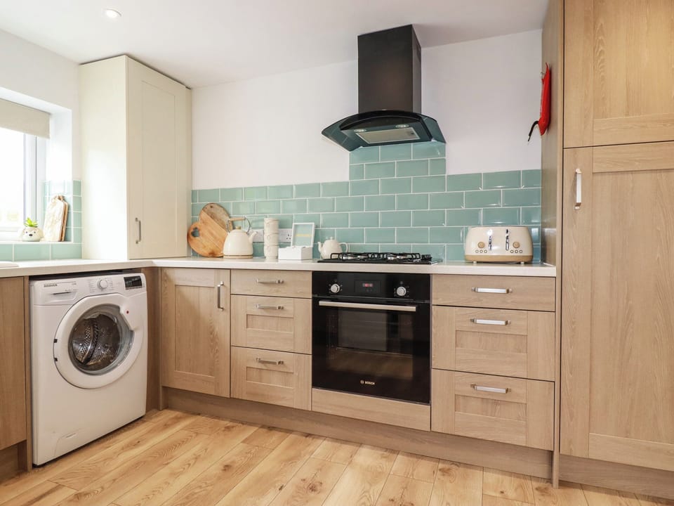 Fridge, electric kettle, toaster, cookware/dishes/utensils