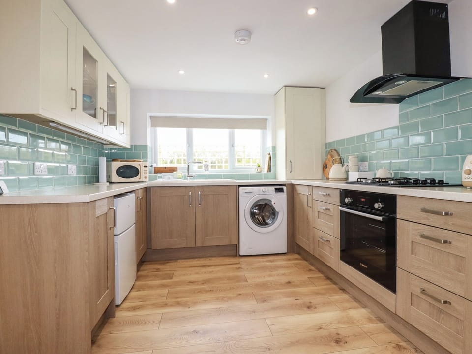 Fridge, electric kettle, toaster, cookware/dishes/utensils