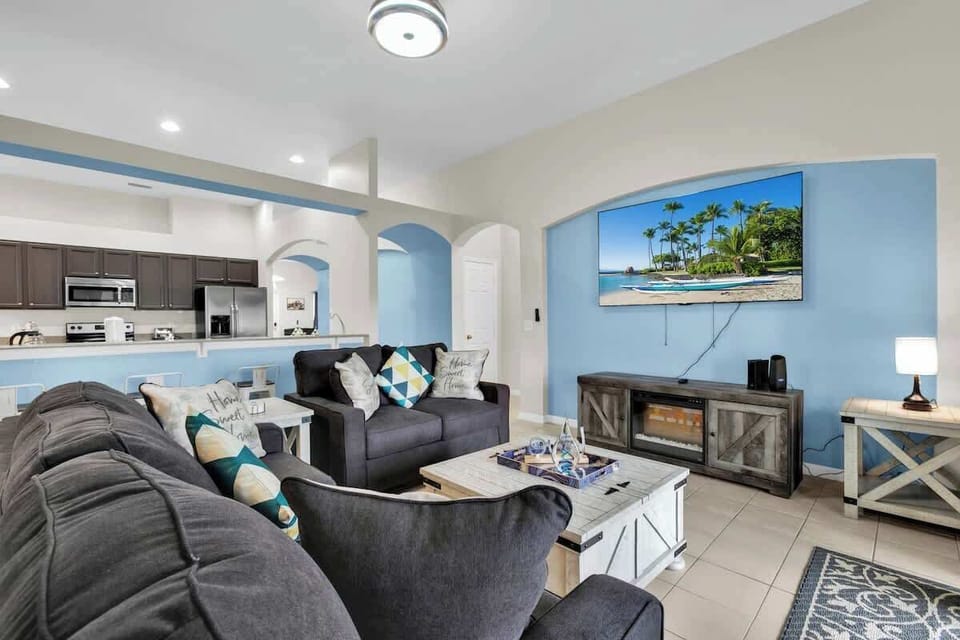 Sink into comfort in the living room oasis, featuring a plush sofa sleeper and a 75" HDTV with Roku for the ultimate entertainment experience.