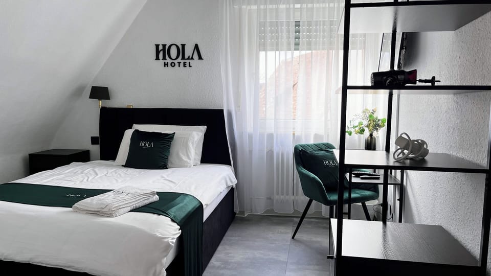 Hypo-allergenic bedding, desk, laptop workspace, free WiFi
