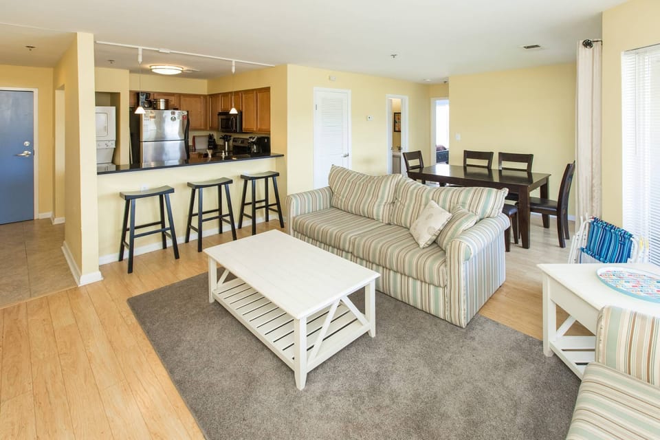Living room with eating bar and Kitchen