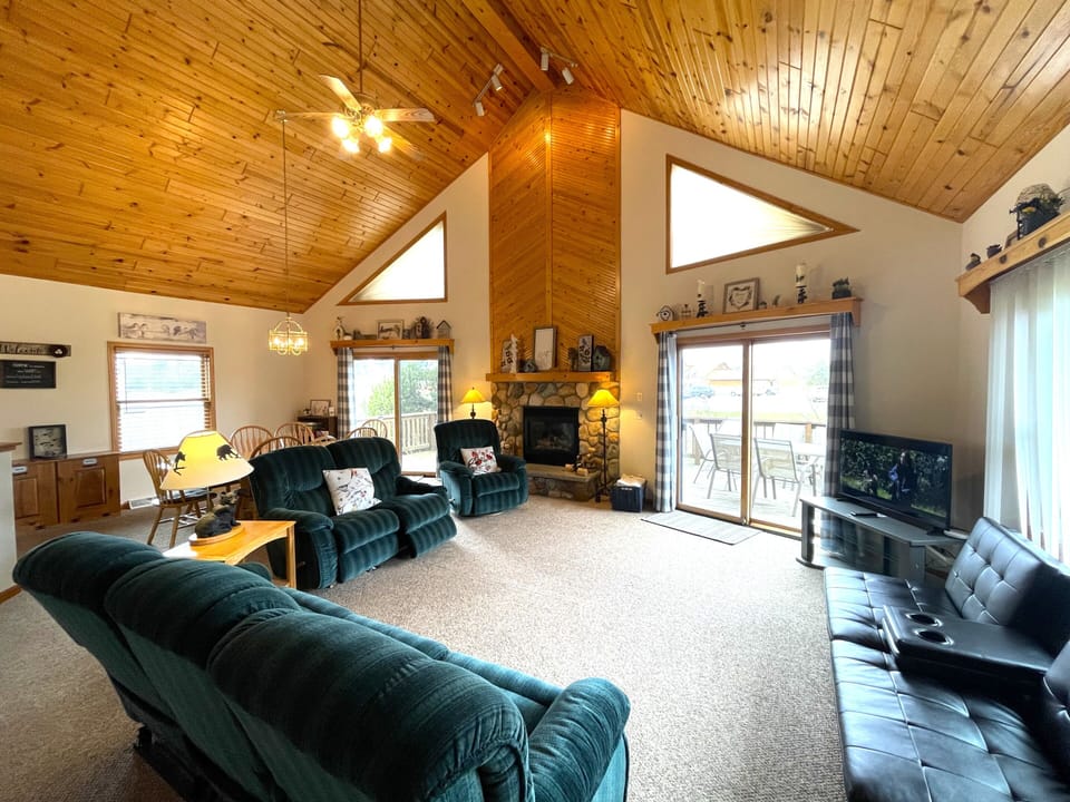 Living Room with Cozy Seating, Futon, TV & Fireplace