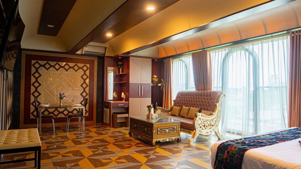 Junior Suite | Living area | 45-inch LED TV with satellite channels