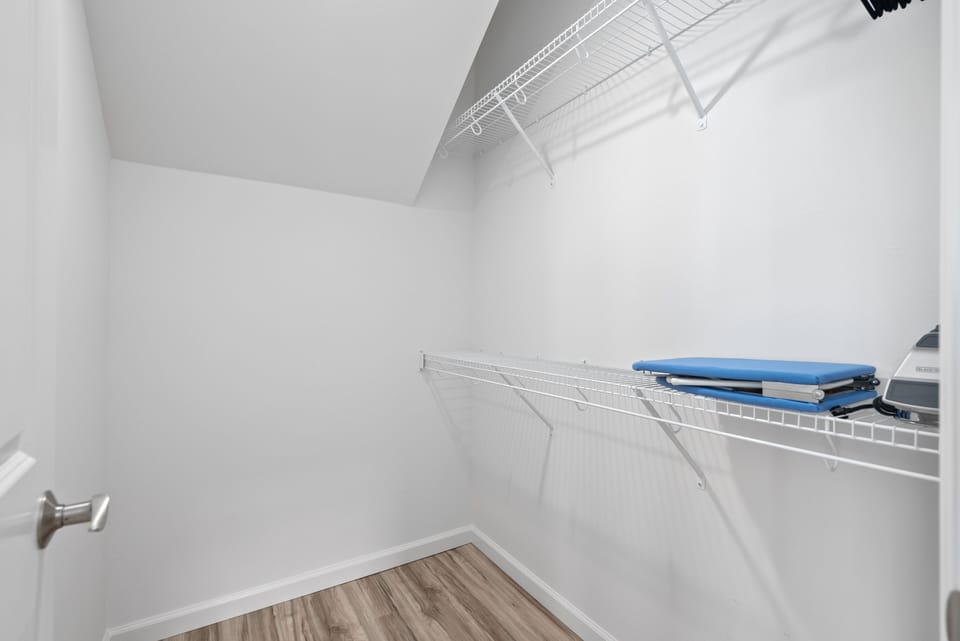 Primary bedroom's walk-in closet.