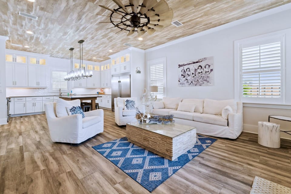 6-seat Golf Cart FREE during your stay! 2 minutes to the beach. Sleeps 13, 6 bedrooms, 5.5 bath, and 8 beds. Game room and bunk room. Heated pool across from the house!