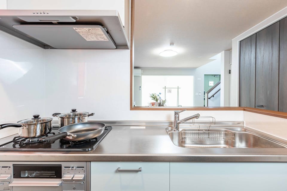 Comfort Villa | Private kitchen | Full-size fridge, microwave, stovetop, electric kettle