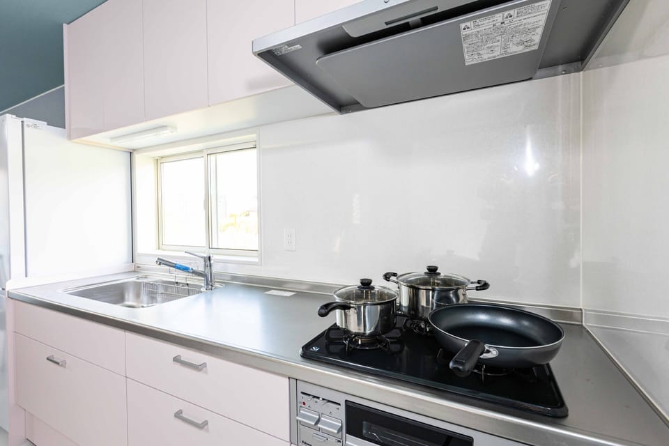 Design Villa | Private kitchen | Microwave, electric kettle, toaster, rice cooker