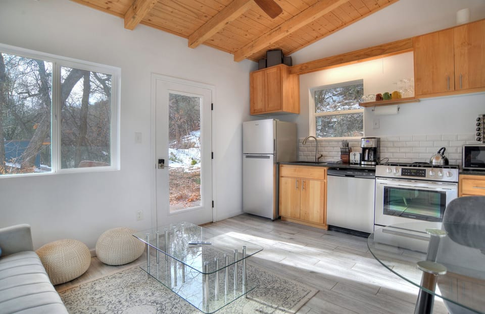 Living, Dining and Fully Stocked Kitchen