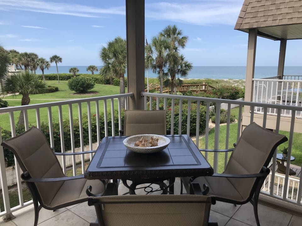 private furnished balcony overlooking the beach & Gulf of Mexico, facing West 
