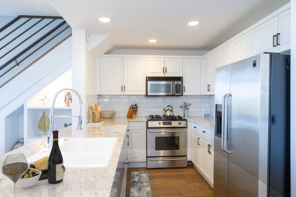 Condo, 4 Bedrooms | Private kitchen | Coffee/tea maker, fridge, oven