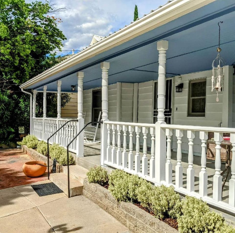 Entrance to home. Wraparound porch.  Great place to enjoy that first cup of Joe.
