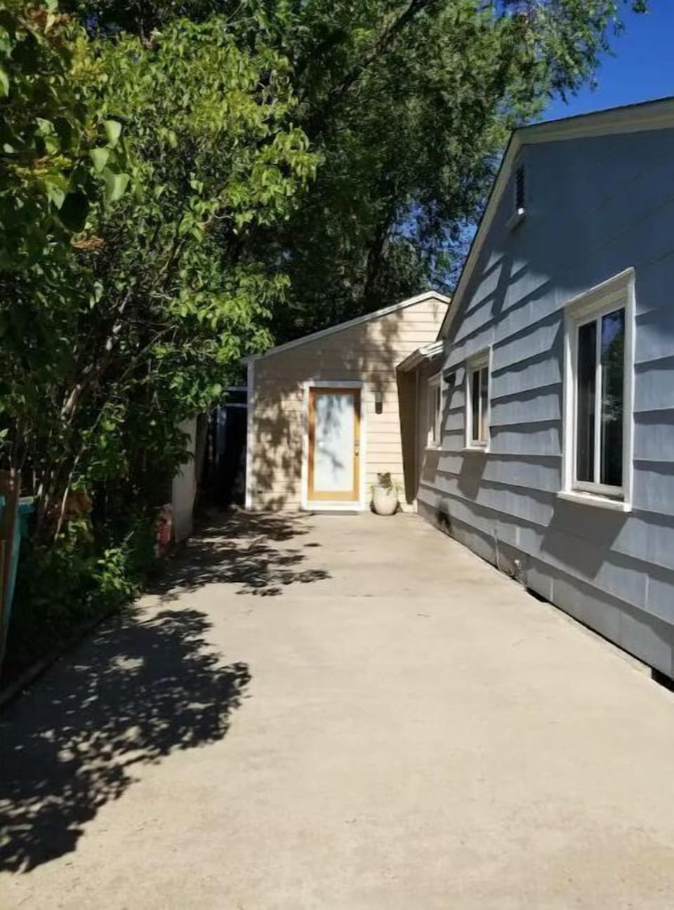 This is your private driveway parking spot! Entry door straight ahead.