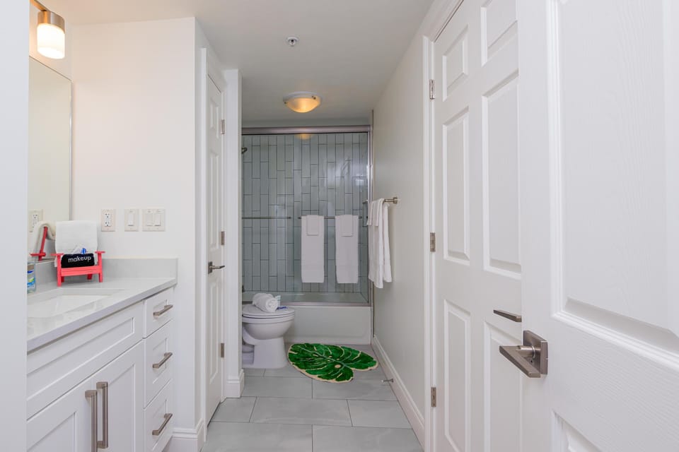 First of 2 bathrooms offers a shower/tub combination.