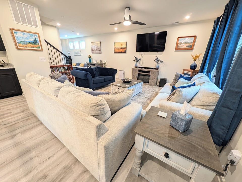 Cozy Great Room with Electric Fireplace, 65" Smart TV, board games  & blankets