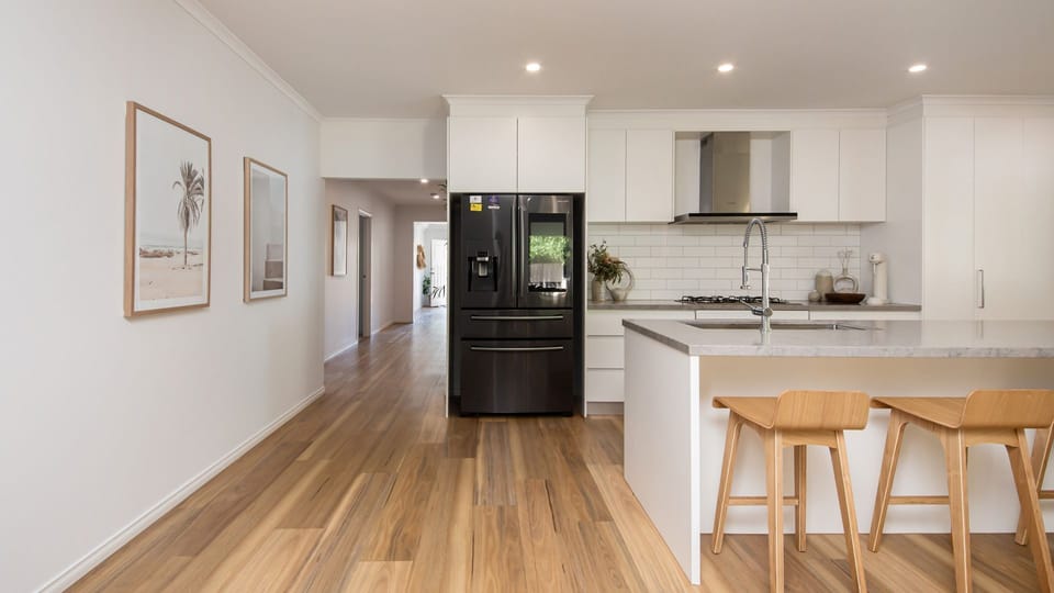 Light and bright living spaces. Large fridge with water dispenser