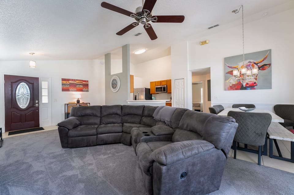 Living Room showing sectional and open floor plan
